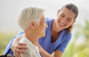 Older adults share a table during a relaxed group activity in an assisted living community.